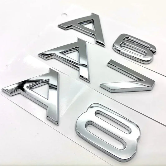 Audi model symbols in black and silver colors