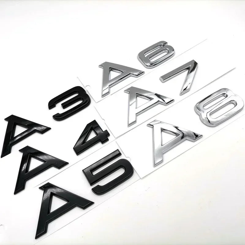 Audi model symbols in black and silver colors
